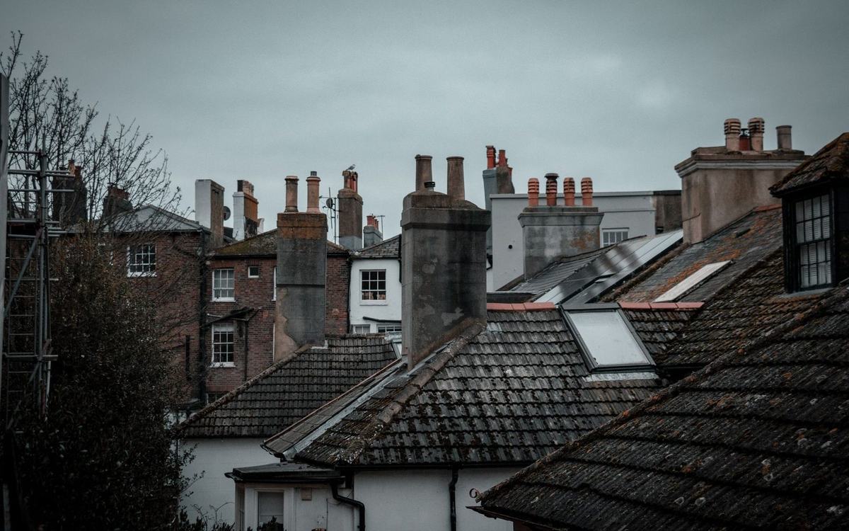 Chimney stacks on the rooftops of old British houses